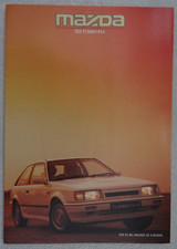 MAZDA 323 TURBO 4X4 Brochure 1986: 1600 DOHC 16 Valve Turbo: RALLYE & LUX. 8 pgs