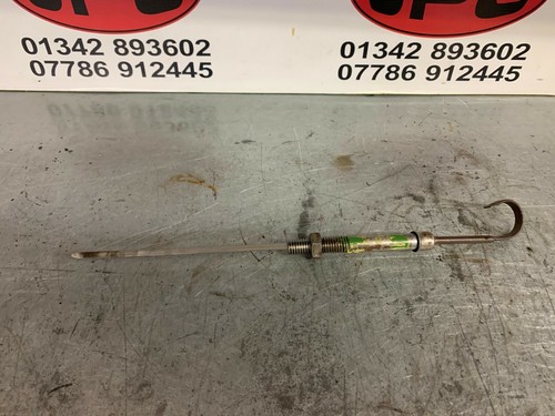 Oil level dipstick holder - level, +