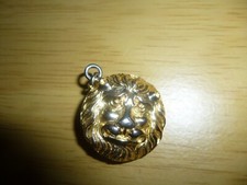Vintage gold tone Green man?? pendant/brooch. 3cm. (D33d)