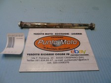 Shock absorber axle pin