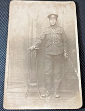 WW 1 period STANDING SOLDIER IN UNIFORM - very old and worn Black/White postcard