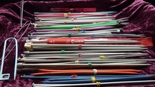 Large bundle of vintage steel and plastic knitting needles. Range of sizes