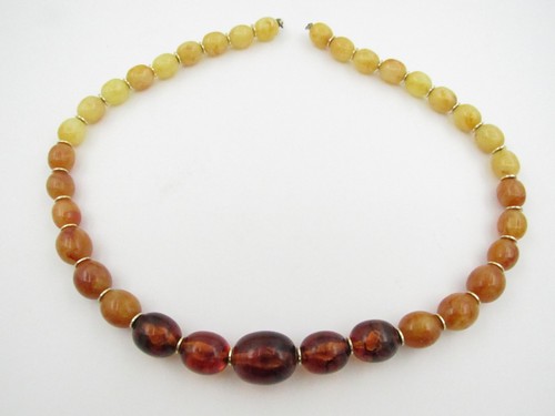 Vintage graduated amber resin - graduated,