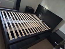 IKEA Malm king size bed with four drawers and side tables