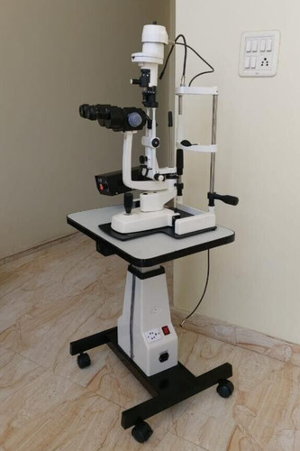 Slit lamp with motorized - lamp, table
