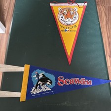 Vintage SeaWorld and P&O Ferries souvenir felt pennants.