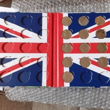 UK 50p album  with  13