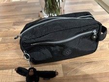 Kipling Multi Pocketed Design