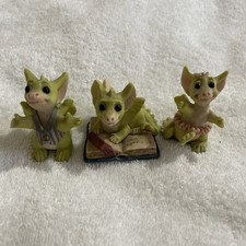 The Whimsical World Of Pocket Dragons  by Real Musgrave. ( damaged )