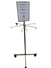 REVOLVING STAND STAINLESS STEEL WHEELS. IDEAL FOR  DRAPES/SCARVES SHOP DISPLAYS