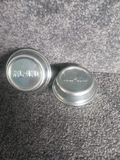 A Pair Of Genuine AL-KO 56mm Trailer Hub Dust Caps.