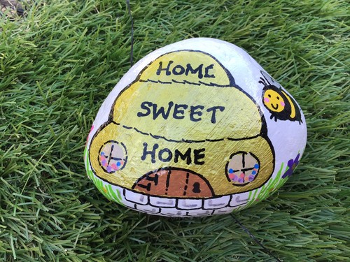 Hand painted bee hive pebble - hand,