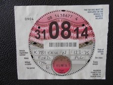 collectable road tax disc from 2014 with original sleeve for a Ford •`~~~~