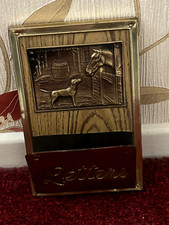 Wall mounted letter rack.