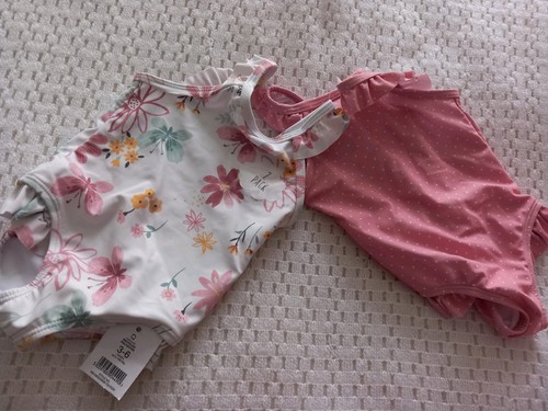 Two baby girls - two, in