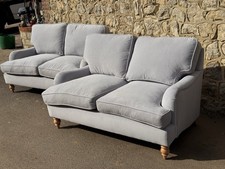 Matching Pair of Grey Two-Seater Sofas with Footstool – Premium Set