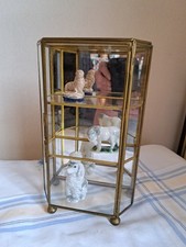 Vintage Mirrored Octagonal 3 tiered glass and brass curio display cabinet.