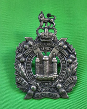 Leicestershire Regiment military cap badge with slider
