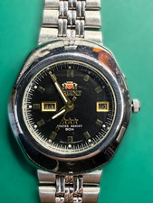 ORIENT Tri Star Day Date