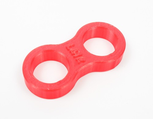 Red fuel tank outlet retainer - tank,
