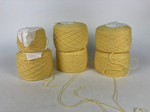 Lot yellow yarn cakes - 6,