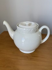 Vintage cream teapot made by