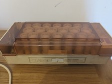 Vintage Clairol Heated Curlers