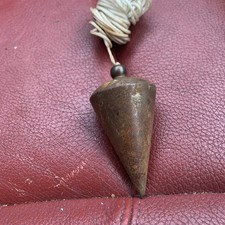 Vintage old carpentry plumb