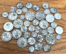 House clearance Antique Tobacco tin packed with pre 1947 silver .500 coins.