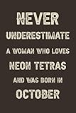 Never underestimate a woman who loves Neon Tetras and was born in October: A perfect gift for Neon Tetras lovers born in October | Funny Gift For ... | Size ”6x9” Lined Notebook | 110 Pages