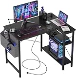 BEXEVUE L Shaped Gaming Desk with Power Outlets, 100x70 cm Computer Desk with Storage Bag, Office Desk Small Writing Table with Large Reversible Storage Shelves, Workstation Study Home Office, Black