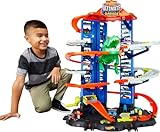 Hot Wheels City Ultimate Garage Playset with Multi-Level Racetrack, 91 cm Tall Moving T-Rex Dinosaur, Parks 100 Cars, Includes 2 Toy Cars, Toys for Ages 5 to 8, One Pack, GJL14