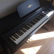 white baby grand piano for sale