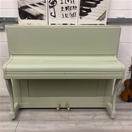 black upright piano for sale