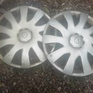 16 hubcaps for sale