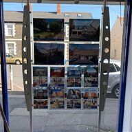 estate agent window display used for sale for sale