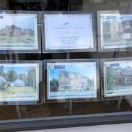 estate agent window display used for sale