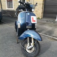 red vespa scooter for sale