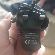 mains car adapter for sale
