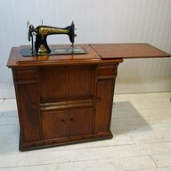 singer sewing machine cabinet for sale